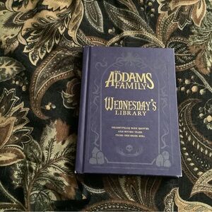 The Addams Family WEDNESDAY’S library hardcover purple book